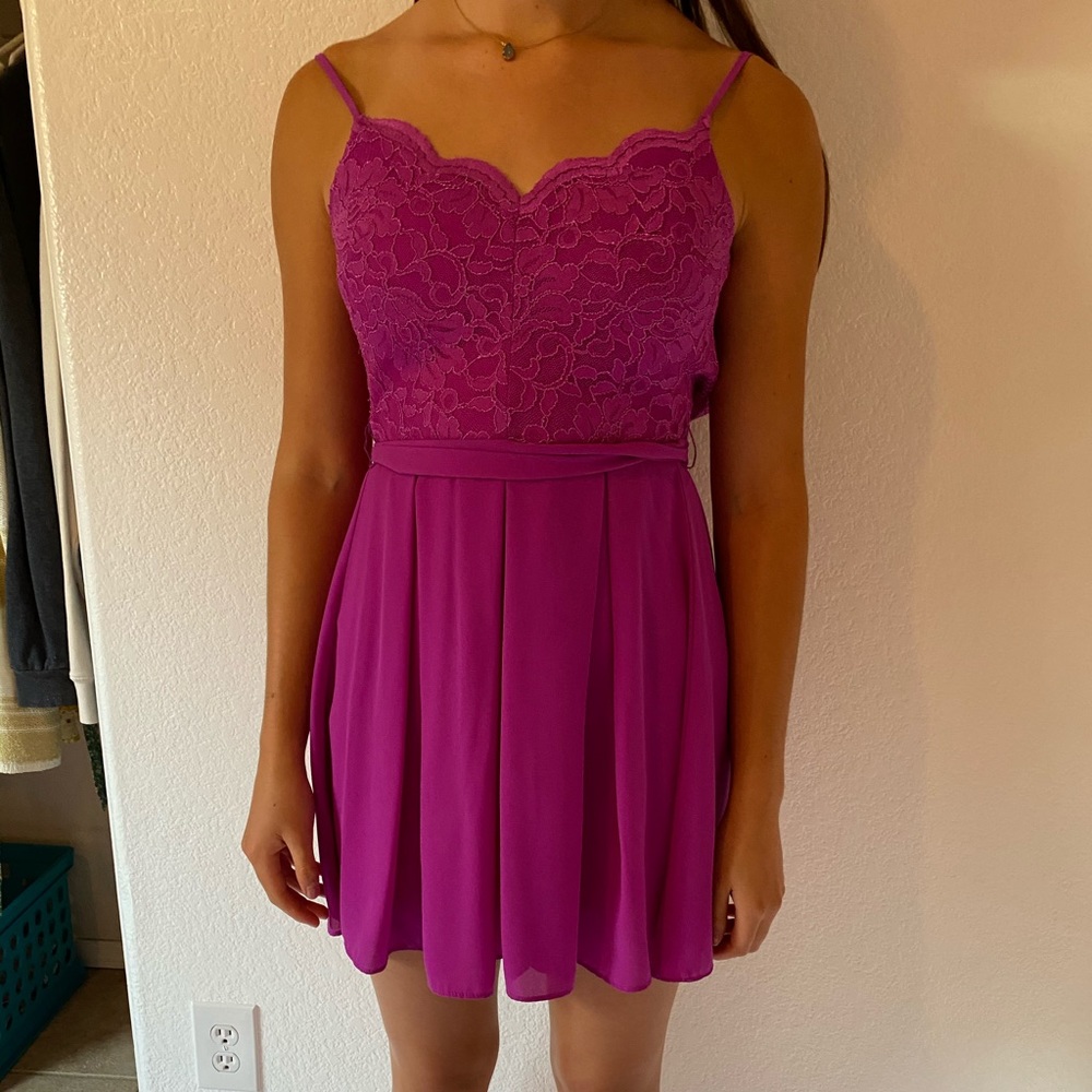 Bright purple tie back dress